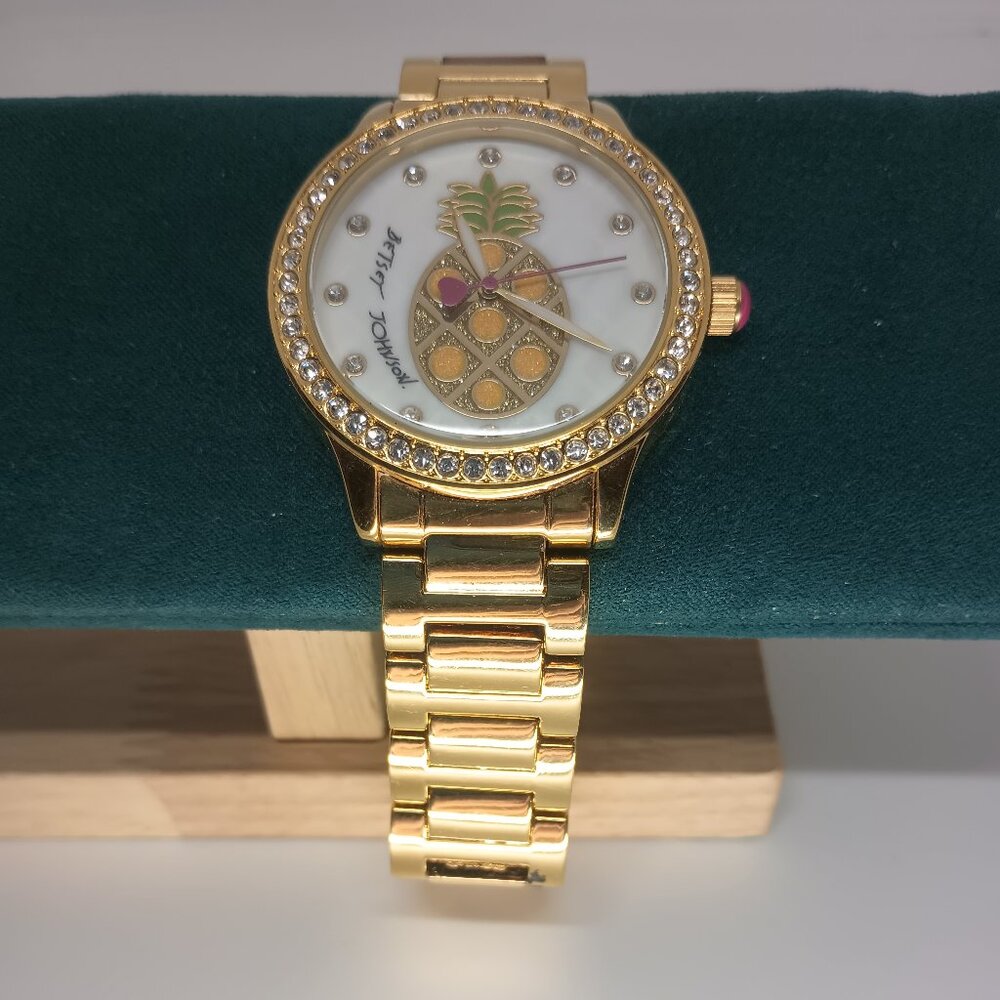 Betsy Johnson Gold Pineapple with glitter bezel watch.